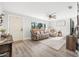 Living room with light gray walls and wood-look floors at 300 S Brighton Dr, Port Orange, FL 32127