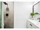 Contemporary bathroom with a walk-in shower and gray tile at 3012 Amherst Ave, Orlando, FL 32804