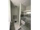 Modern bathroom with a large walk-in shower and marble tile at 3367 S Kirkman Rd # 1116, Orlando, FL 32811