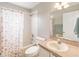 Bathroom with tub shower combo and vanity at 3418 Gator Bay Creek Blvd, St Cloud, FL 34772