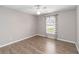 Simple bedroom with wood flooring and a ceiling fan at 3418 Gator Bay Creek Blvd, St Cloud, FL 34772