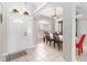 Bright dining area with tile floors and arched entryway at 3418 Gator Bay Creek Blvd, St Cloud, FL 34772