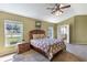 Cozy bedroom with a double bed and ensuite bathroom access at 346 Hickory Springs Ct, Debary, FL 32713