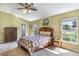 Main bedroom with a double bed and ample closet space at 346 Hickory Springs Ct, Debary, FL 32713