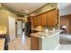 Kitchen with black appliances and corner sink, offering lots of counter space at 346 Hickory Springs Ct, Debary, FL 32713