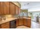 Kitchen with ample counter space, a double sink, and wood cabinets at 346 Hickory Springs Ct, Debary, FL 32713