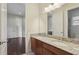 Shared bathroom with double vanity and granite countertops at 3764 Farm Bell Pl, Lake Mary, FL 32746