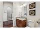 Elegant bathroom with granite countertops and updated fixtures at 3764 Farm Bell Pl, Lake Mary, FL 32746