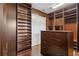 Large walk-in closet with custom built-ins and shelving at 3764 Farm Bell Pl, Lake Mary, FL 32746