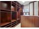 Large walk-in closet with custom built-in shelving at 3764 Farm Bell Pl, Lake Mary, FL 32746