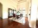 Formal dining room with hardwood floors and a large chandelier at 3764 Farm Bell Pl, Lake Mary, FL 32746