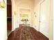 Elegant hallway with hardwood floors and art at 3764 Farm Bell Pl, Lake Mary, FL 32746