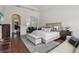 Luxurious main bedroom with sitting area and hardwood floors at 3764 Farm Bell Pl, Lake Mary, FL 32746