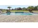 Beautiful pool area with mature landscaping, creating a private outdoor oasis at 3764 Farm Bell Pl, Lake Mary, FL 32746