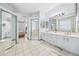 Elegant bathroom with double vanity and tiled floors at 3788 Brantley Place Cir, Apopka, FL 32703