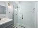 Clean bathroom featuring a walk-in shower with marble tile at 3788 Brantley Place Cir, Apopka, FL 32703