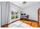 Bright home office featuring wood floors and large window at 3788 Brantley Place Cir, Apopka, FL 32703