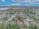 Aerial view showcasing home's location in a well-established neighborhood with mature trees and landscaping at 3838 Gatlin Place Cir, Orlando, FL 32812