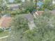 Aerial view of house, showing roofline, yard, and neighborhood at 3838 Gatlin Place Cir, Orlando, FL 32812