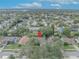 Aerial view of house, showing roofline, yard, and neighborhood at 3838 Gatlin Place Cir, Orlando, FL 32812