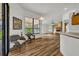 Bright dining area with wood floors and view of backyard at 3838 Gatlin Place Cir, Orlando, FL 32812