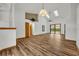 High ceiling living room with hardwood floors and skylights at 3838 Gatlin Place Cir, Orlando, FL 32812