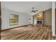 Living room with wood floors, fireplace and lots of natural light at 3838 Gatlin Place Cir, Orlando, FL 32812