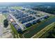 Aerial view of the community, showcasing townhomes and a canal at 4295 Campsite Loop, Orlando, FL 32824