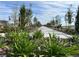 Landscaped community walkway with benches at 4299 Campsite Loop, Orlando, FL 32824