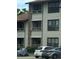 Building exterior showcasing multiple units and parking at 4653 Cason Cove Dr # 2713, Orlando, FL 32811