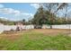 Large backyard with garden, pergola, and storage shed at 513 Seminole Ave, Fruitland Park, FL 34731