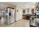 Kitchen with stainless steel appliances and dark wood cabinets at 513 Seminole Ave, Fruitland Park, FL 34731