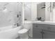 Clean bathroom with gray vanity and bathtub at 5265 Forest Edge Ct, Sanford, FL 32771