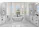 Spa-like bathroom with a soaking tub and double vanity at 5265 Forest Edge Ct, Sanford, FL 32771