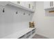 Convenient drop zone with built-in storage and hooks at 5265 Forest Edge Ct, Sanford, FL 32771