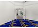 Prayer room with blue rug and view of hallway at 5265 Forest Edge Ct, Sanford, FL 32771