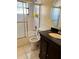 Clean bathroom with tub, shower, toilet and vanity at 5581 Aeolus Way, Orlando, FL 32808