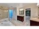 Main bathroom features a large vanity, shower, and garden tub at 601 Kelly Green St, Oviedo, FL 32765