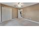 Bedroom with double door closet and access to upper hallway at 601 Kelly Green St, Oviedo, FL 32765