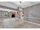 Dining area with hardwood floors and a modern chandelier at 601 Kelly Green St, Oviedo, FL 32765