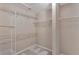 Spacious walk-in closet with wire shelving at 601 Kelly Green St, Oviedo, FL 32765