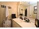 Bathroom with a framed mirror over the vanity, complete with decorative touches at 686 Lake Villas Dr # 686, Altamonte Springs, FL 32701