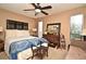 Bedroom featuring a decorative headboard and ample natural light at 686 Lake Villas Dr # 686, Altamonte Springs, FL 32701