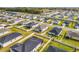 Aerial view of a residential neighborhood with many homes at 776 Rioja Dr, Minneola, FL 34715