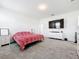 Spacious bedroom with large TV and ample closet space at 776 Rioja Dr, Minneola, FL 34715