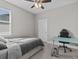 Bedroom with desk, chair, and a double bed at 803 Fraser Dr, Poinciana, FL 34759