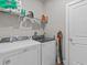 Laundry room with Whirlpool washer and dryer at 803 Fraser Dr, Poinciana, FL 34759