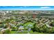Aerial view of the neighborhood with community pool and tennis courts at 10118 Allenby Ct, Orlando, FL 32821