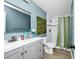 Charming bathroom with a vanity, mirror, and shower, offering a functional and stylish space at 10118 Allenby Ct, Orlando, FL 32821