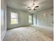Spacious bedroom with neutral walls, carpet, and ample closet space at 10118 Allenby Ct, Orlando, FL 32821